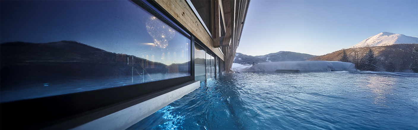 Außenpool mit Alpenblick – HUBERTUS Mountain Refugio